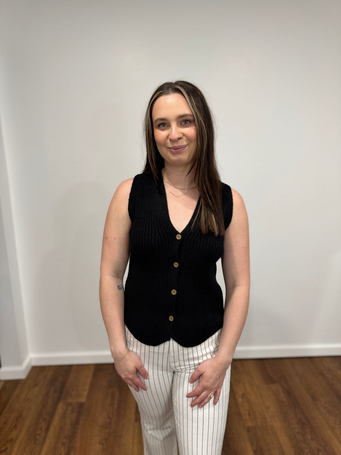 black sleeveless sweater vest